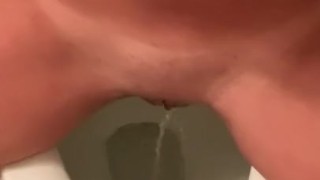 Quick piss while I play with myself on the toilet