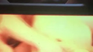 Watching porn while satisfying this cat