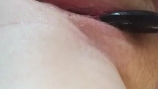 Chubby girl plays with pussy plug