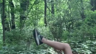 Horny teen plays with pussy while hiking