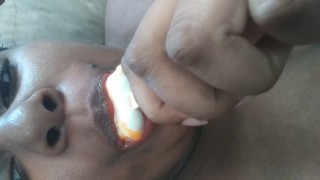 Sucking on a popsicle