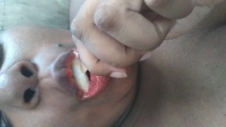 Sucking on a popsicle