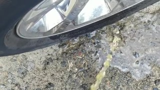 Country Girl Stamds and Pees On Truck Tire