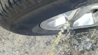 Country Girl Stamds and Pees On Truck Tire
