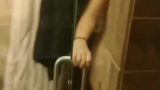 Spying on wife showering.