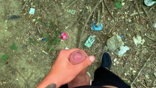 Glossy glans with precum cums at the cruising sex area