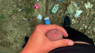 Glossy glans with precum cums at the cruising sex area