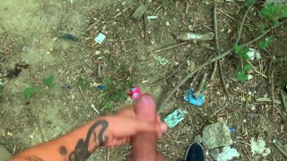 Glossy glans with precum cums at the cruising sex area