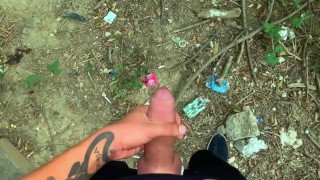 Glossy glans with precum cums at the cruising sex area