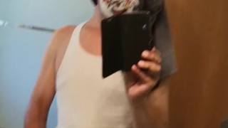 Masked young guy jerks and shoots a load