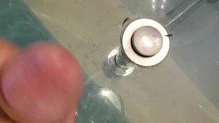 Masked young guy jerks and shoots a load