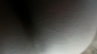 Masturbating