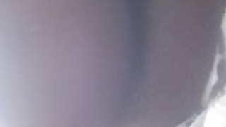 Masturbating