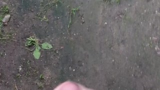 Teen boy cumming near an abandoned building