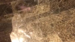 Reno, NV hotel shower door reflection stroking white cock