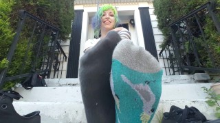 My neighbor is watching me show off my stinky sweaty soles!