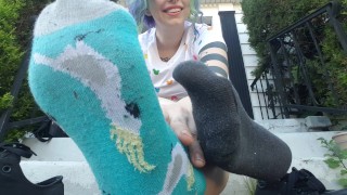 My neighbor is watching me show off my stinky sweaty soles!