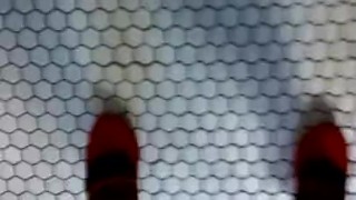 Domme strap-on with fishnet stockings, giggling