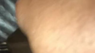 Masturbating
