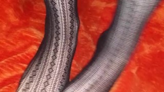 Fishnet foot tease with small cute feet from BabyB
