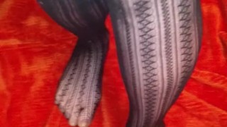 Fishnet foot tease with small cute feet from BabyB
