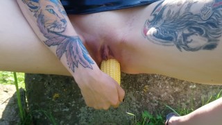Shameless Lucy Ravenblood fucking pussy with corn in public