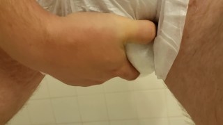 Playing with my diaper filled to the max