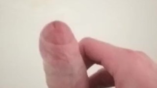 Slow wank with gentle grip right up to and during cumshot