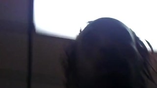 Black man walking naked in public at work