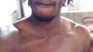 Black man walking naked in public at work