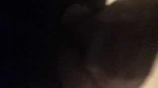 Moaning while taking a thick dildo