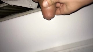 Teen piss out of a window in a entrance of apartment building - Rainy night