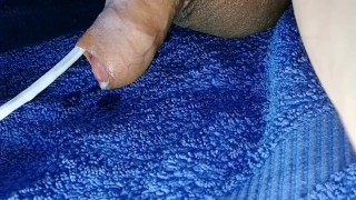 Injecting lotion into my flaccid uncircumcised korean cock, real kink!