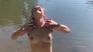 Slut shakes her tits and ass and flashes her tits and pussy publicly