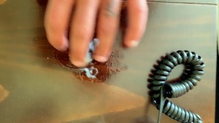 Amateur twink cums on a table and rubs his cum - Under balls view angle