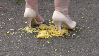 Crush-fetish. Thick legs in heels crushed the corn mercilessly.