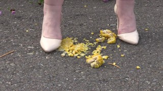 Crush-fetish. Thick legs in heels crushed the corn mercilessly.