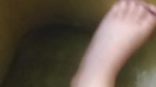 Rubbing Legs in the Bath