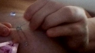teasing nipple with clothes pin