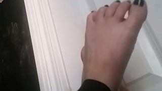 Dani plays with feet