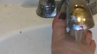 Foot washing in sink
