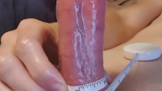 Measuring tape around my throbbing cock