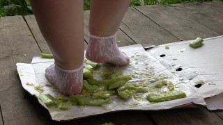crush squashes under your bare heels from behind, white fishnet socks