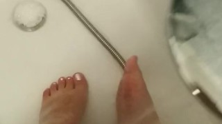 Fat legs feet washing after long day at work