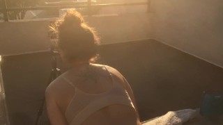 Curvy amateur too busy on her phone to notice she’s on camera.