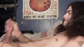 long haired  strokes to huge cum shot