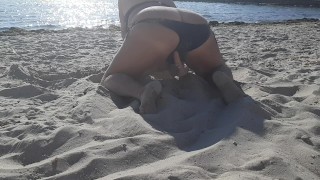 Rubbing my pussy on beach with toy. Hot women relaxing