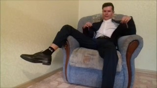 After working in the office, the guy jerks off his cock and ends up in an office suit