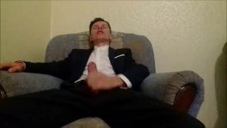 After working in the office, the guy jerks off his cock and ends up in an office suit