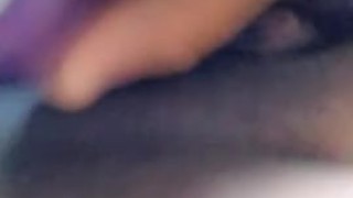 Fucking pussy with purple dildo